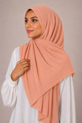 Elegant Peach Scalloped Lace-Border Chiffon Georgette Hijab – Soft Flow Daily Wear Scarf for Women (185 × 75 cm)